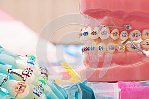 Close up dentist tools and orthodontic model.