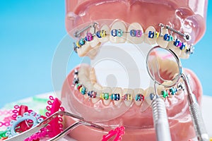 Close up dentist tools and orthodontic model.