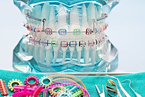 Close up dentist tools and orthodontic model.