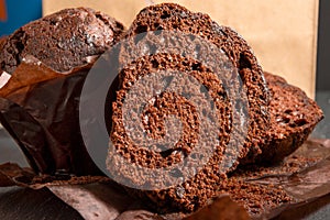 Close-up of dessert chocolate brownie cupcakes on dark background