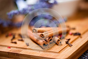 Close up detail of aromatic cinnamon sticks and tea ingredients