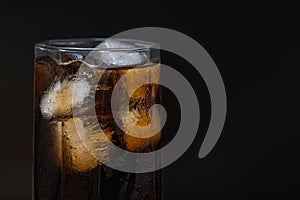 Close up detail of a chilled glass of coke