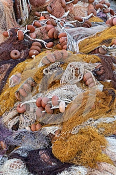 close-up detail of floats and fishing nets for trawlers in many different colours