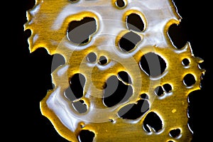 Close up detail of marijuana oil concentrate aka shatter isolate