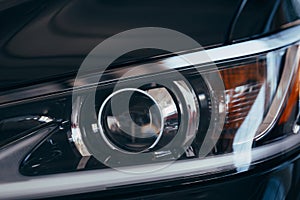 Close up detail on one of the LED headlights modern car
