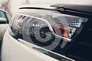 Close up detail on one of the LED headlights modern car.