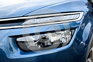 Close up detail on one of the LED headlights modern car