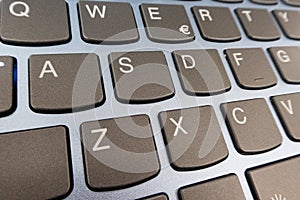 Close-up detail of a QWERTY keyboard of a laptop PC