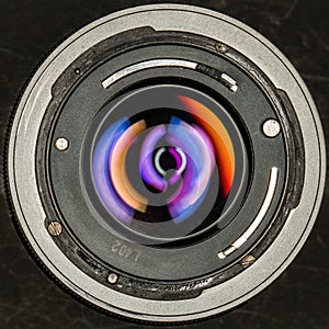 Close up detail of the rear element and mount of a vintage 50mm lens