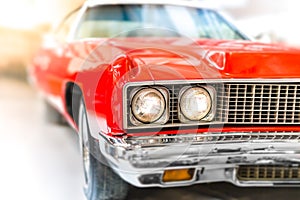 Close Up Detail of Shiny Red Classic Car.