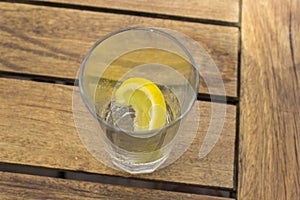 Close-up detail shot of fresh lemon in empty glass on the mediterrian breakfast table at Greece, Lesvos island