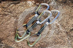 Close up detail shot of a quickdraw, two rock climbing carabiners with a sling or webbing.