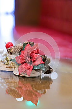 Close up detail of some beautiful Christmas table decorations with red colos. photo