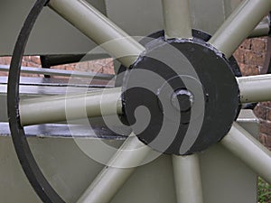 Close-up Detail of a Spoked Wheel of a Cannon