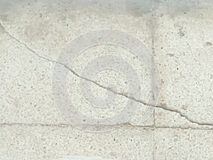 close up detail of the surface of an old ceramic tile or tile floor