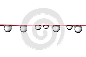 Water droplets on red wire