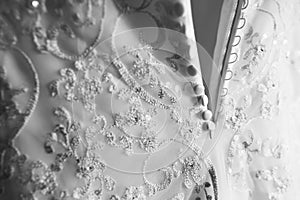 Close-up detail of wedding dress pattern texture. Nice background image
