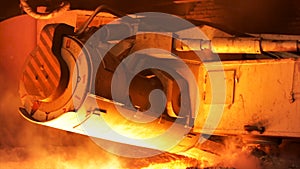 Close up for the detail of the working mechanism at the metal smelting plant. Stock footage. Machine in heavy industry