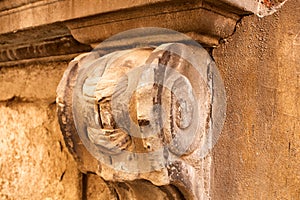 Close up detail of a worn stone Corbel