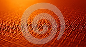 Close-up of Textured Orange Surface with Diamond Pattern and Warm Lighting background