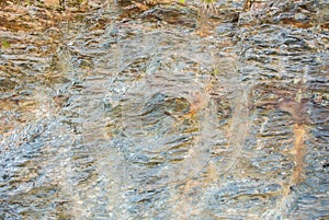 Close up of details of abstract natural stone rock cut texture c