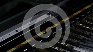 Close up of details of automatic SMD pick and place machine during work. Creative. Assembly of computer printed circuit