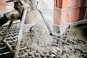 Close up details of cement mortar and concrete pump during indoor constructions