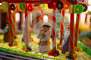 Close-up details of gingerbread Christmas scenery with human fig
