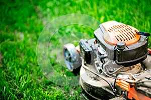 Close up details of lawnmower, industrial grass trimming device and gardening tool