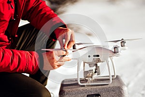 Close up details of man installing drone propellers, getting drone in air for aerial footage, videography and photography