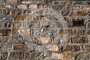 Close-up details of natural rock wall in mountain refuge