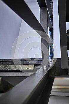 Close-up and details of railing and stairs of a modern building, selective focus