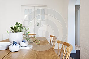 Close up details of scandi styled decor in contemporary dining r