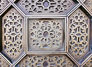 close up details of a traditional Moroccan copper and metal door at the Mohammed V mausoleum in Rabat Morocco