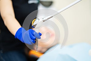 Close-up of a device for professional toothbrushing in a dental clinic. Dental brushing procedure