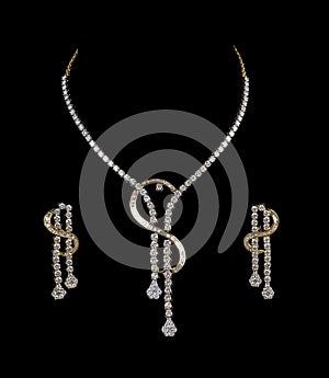 Close up of diamond necklace with diamond ear ring