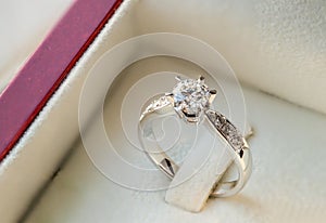 Close up diamond wedding ring in the luxury box.