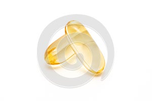 Close up of Dietary supplement oil capsules isolated on a white background, softgel capsules.