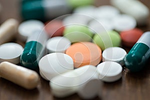 Close up of different drugs on table photo