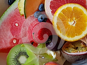 Close-up of different fruits displayed on ice cream