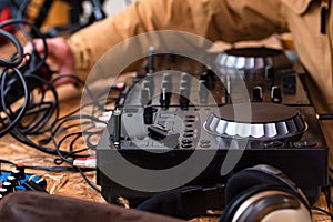 Close-up of DJ`s audio mixing console