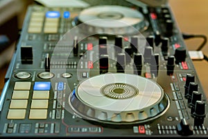 Close-up of DJ`s audio mixing console