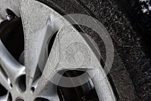 Close up of dirty car alloy wheels.