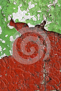 Close up of dirty, crumbling, red concrete wall