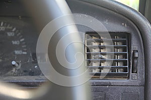 Close up dirty dust air condition vent channel in the old car. f