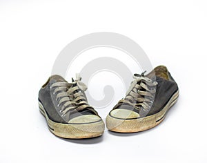 Close up Dirty shoe on isolate white background , close up shoe,dirty blue shoes on the white background , canvas blue shoes ,old