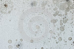 Close-up of a dirty, stained and worn wall