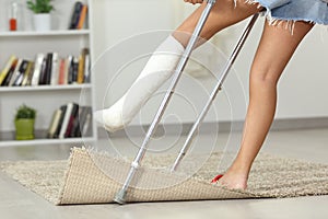 Disabled girl stumbling at home photo