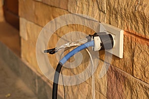 Close-up, a disconnected power plug is dangerous, an unsafe short circuit may occur.