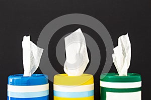 A close up of disinfecting wipes on a black background photo